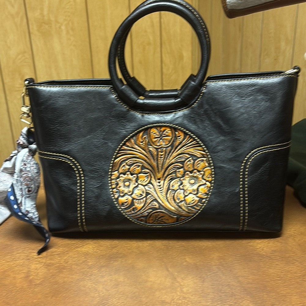 Elegant Black and Gold Handbag